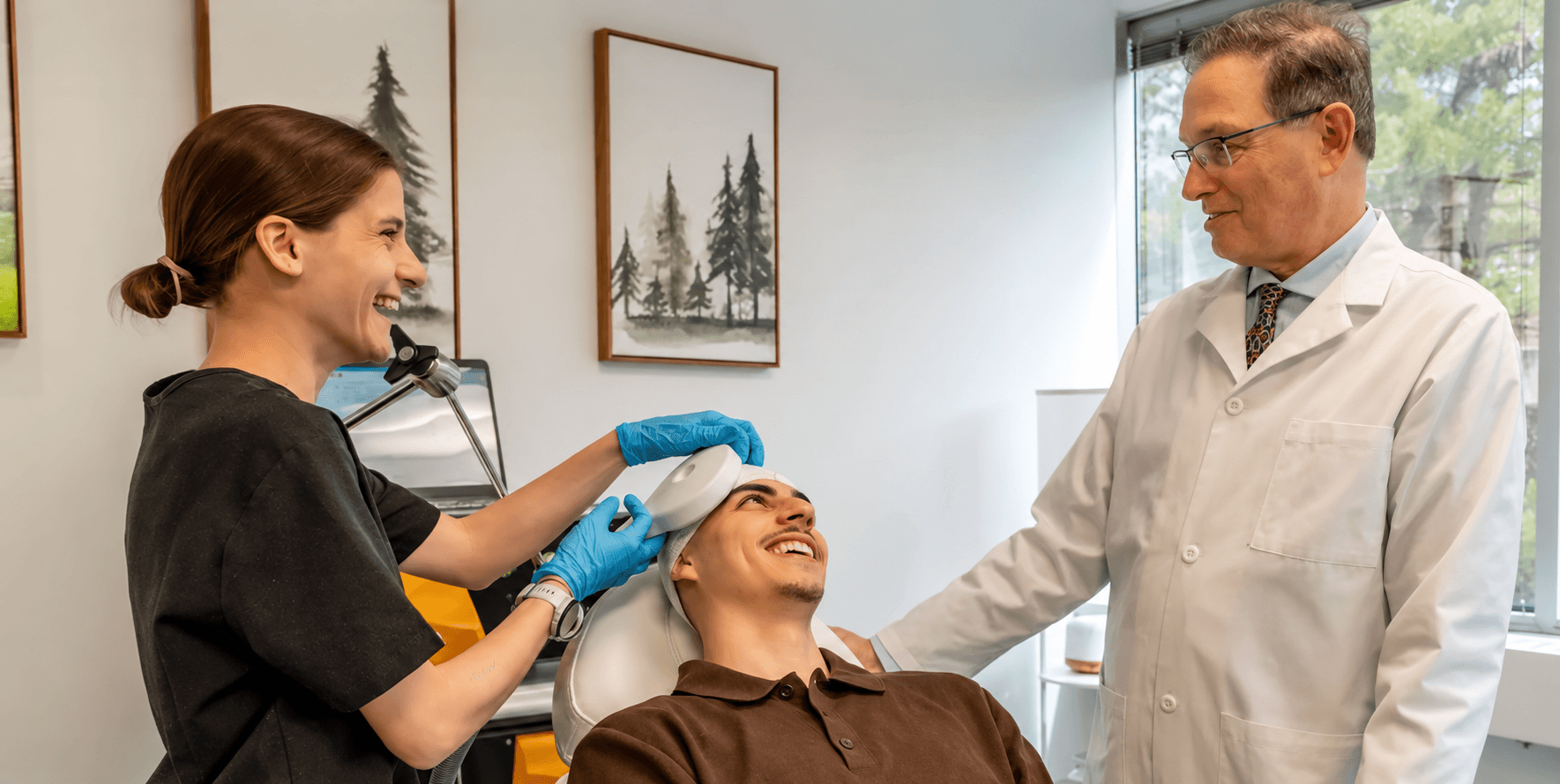 TMS treatment coil positioned against a seated person’s head in a clinical setting